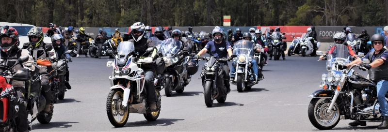 Motorbikes on the road in a large group