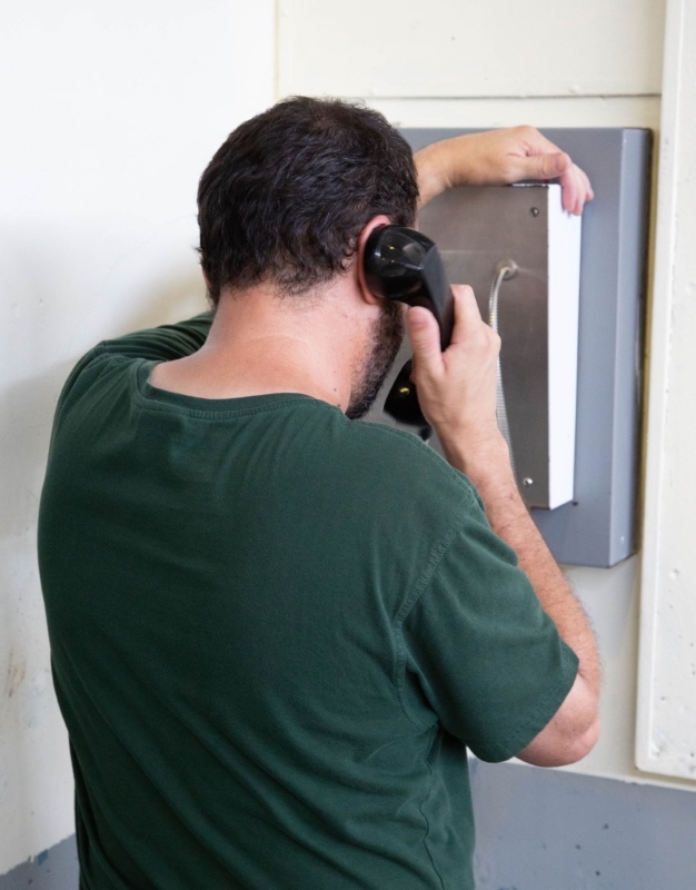 Man talking on telephone