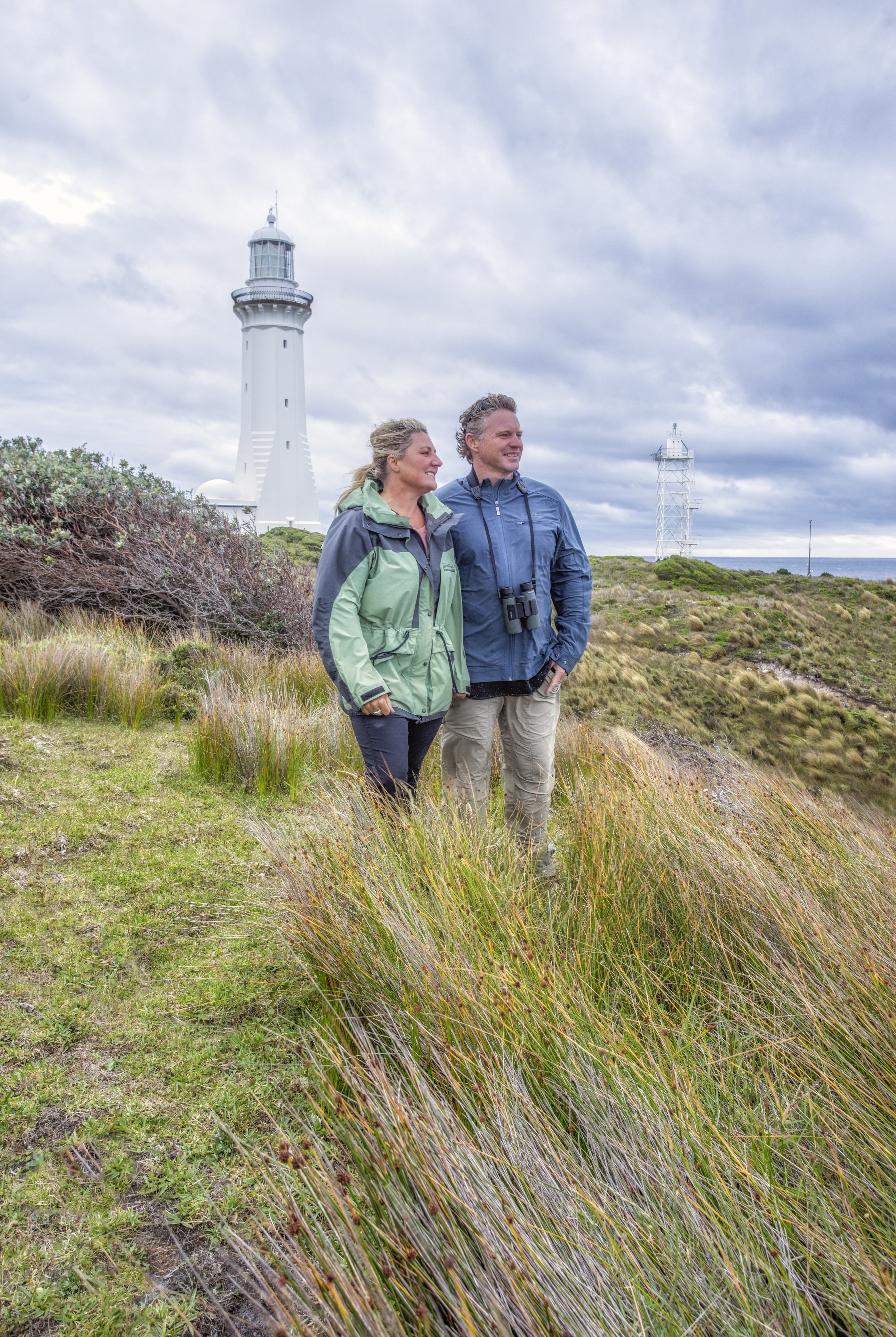 A photo of an older couple in front of Green Cape Lightstation