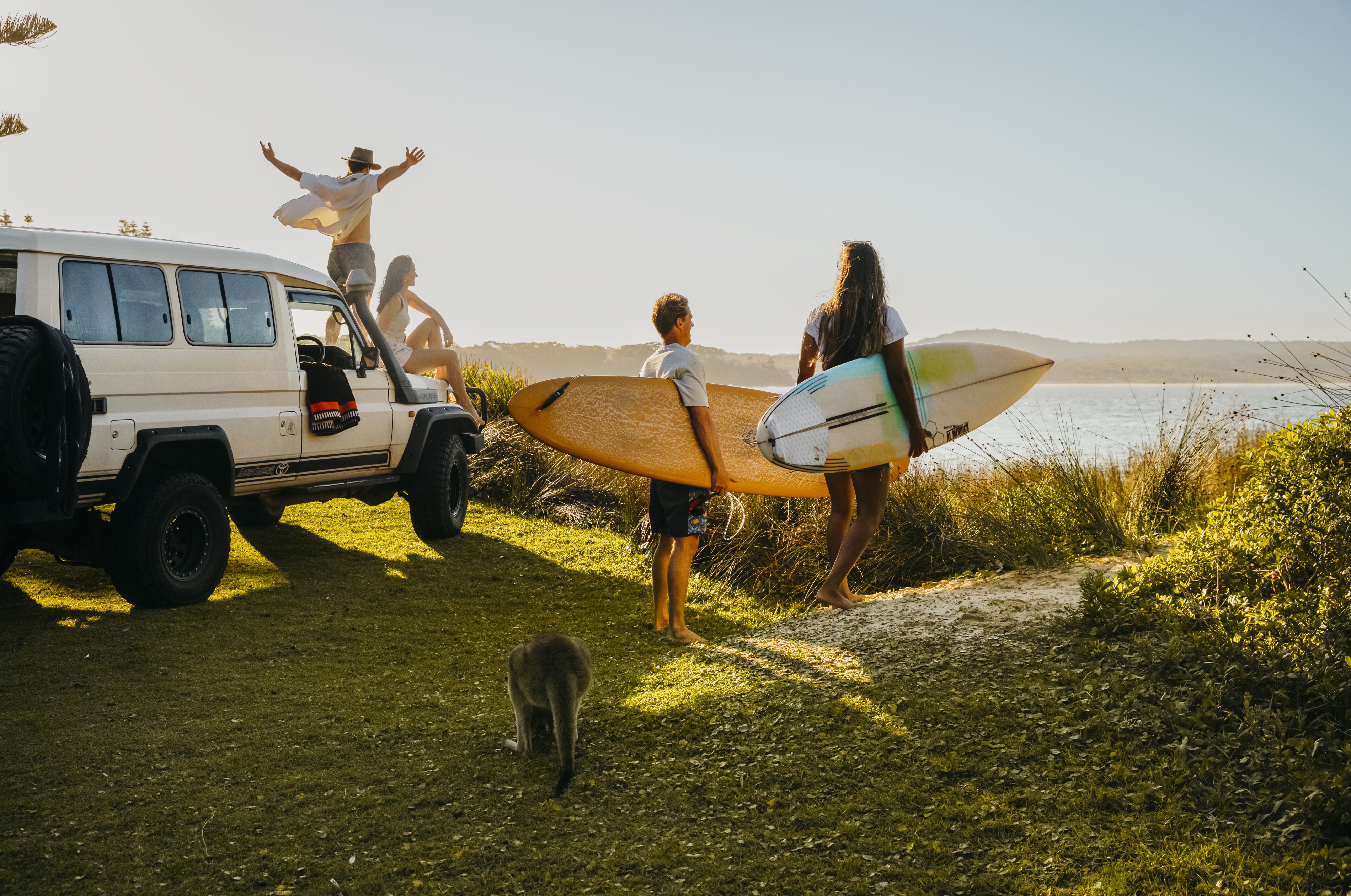 A photo of surfers on the dunes at South Durras