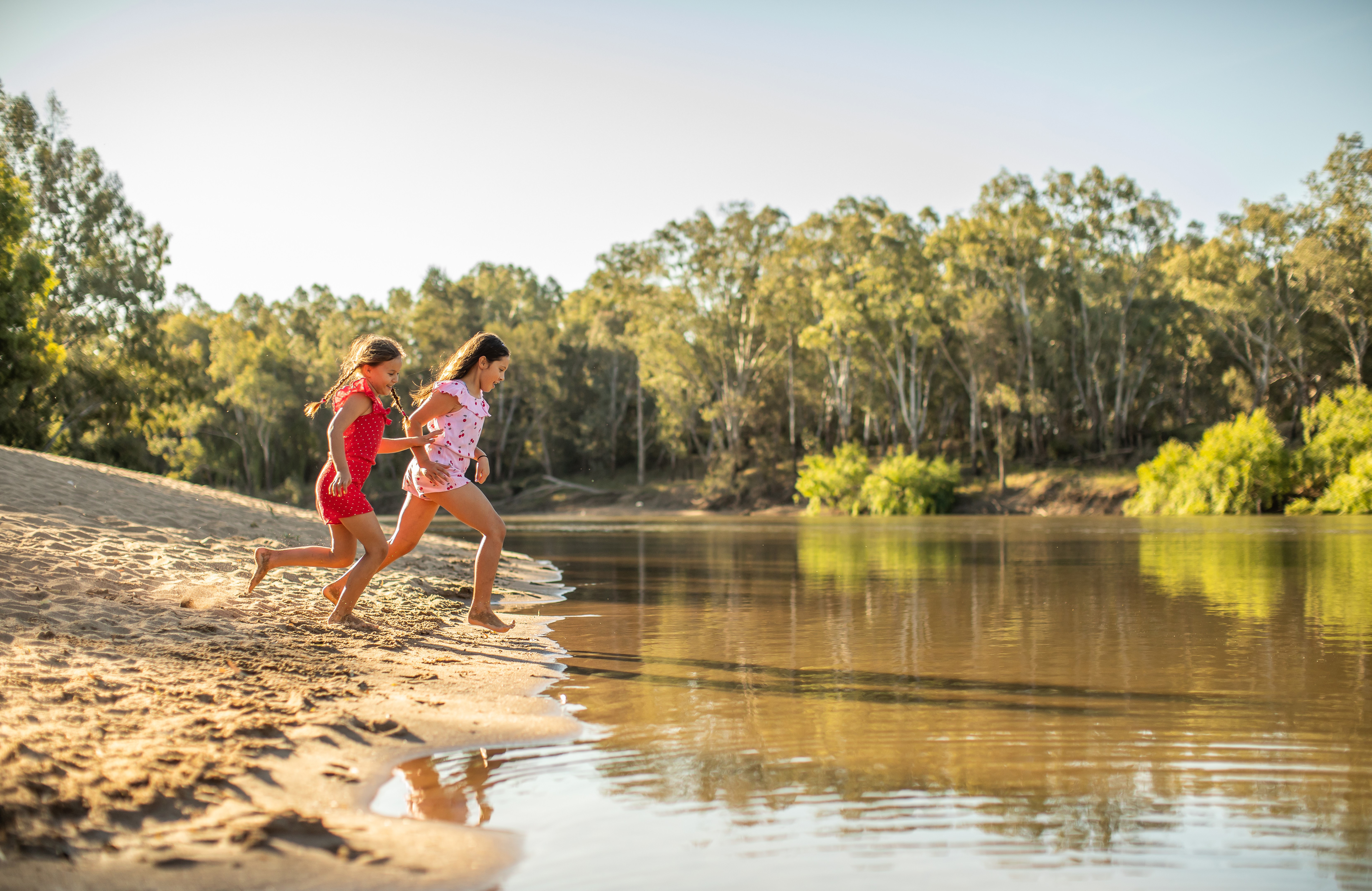 A photo of children running at Wagga Wagga Beach 