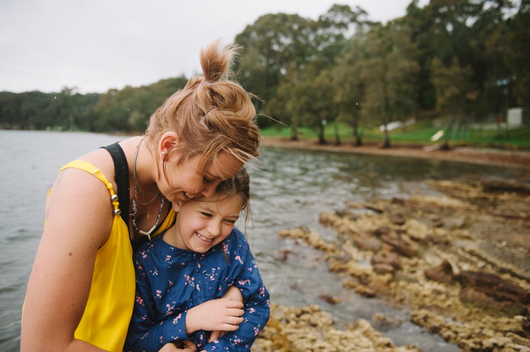 Ann Marie and her daughter cuddling
