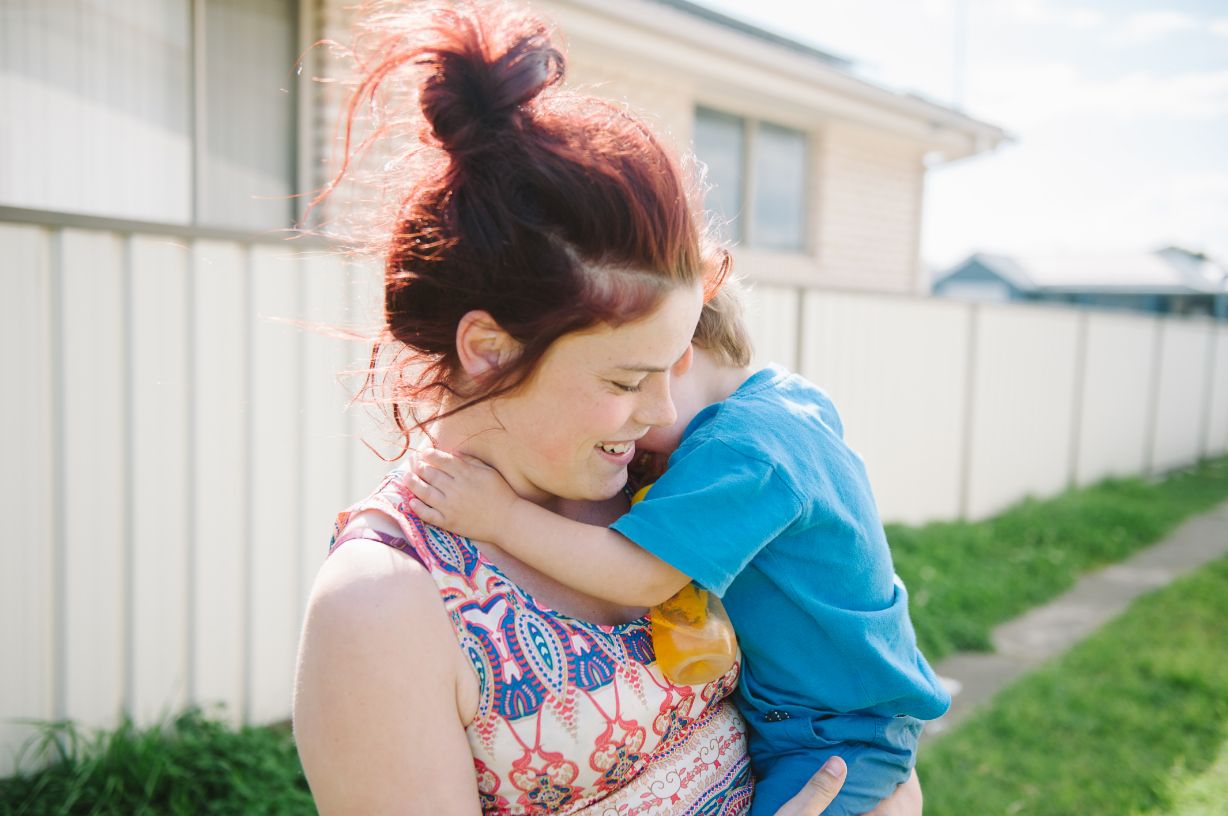 A photo of Amelia and her son hugging