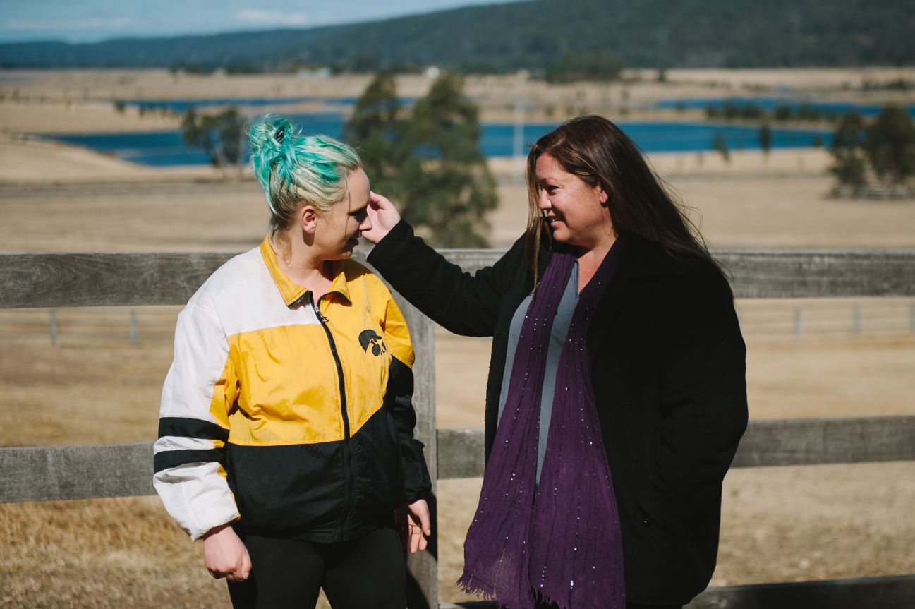 Sarah and Laura-Lee looking at each other