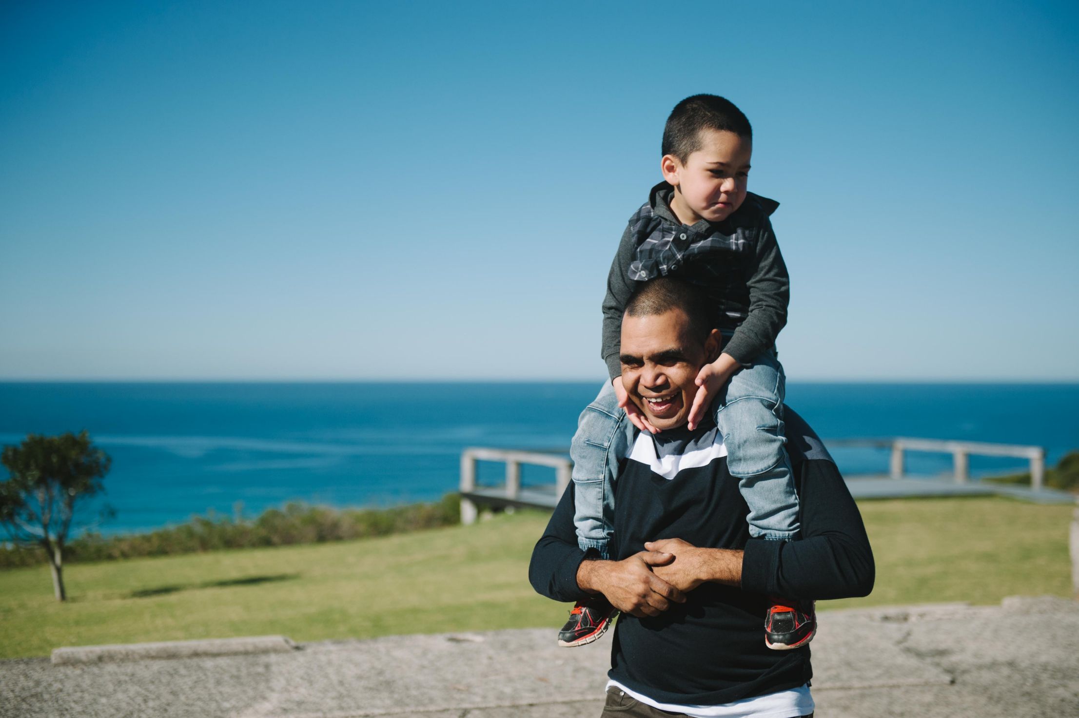 Bundy with his son on his shoulders