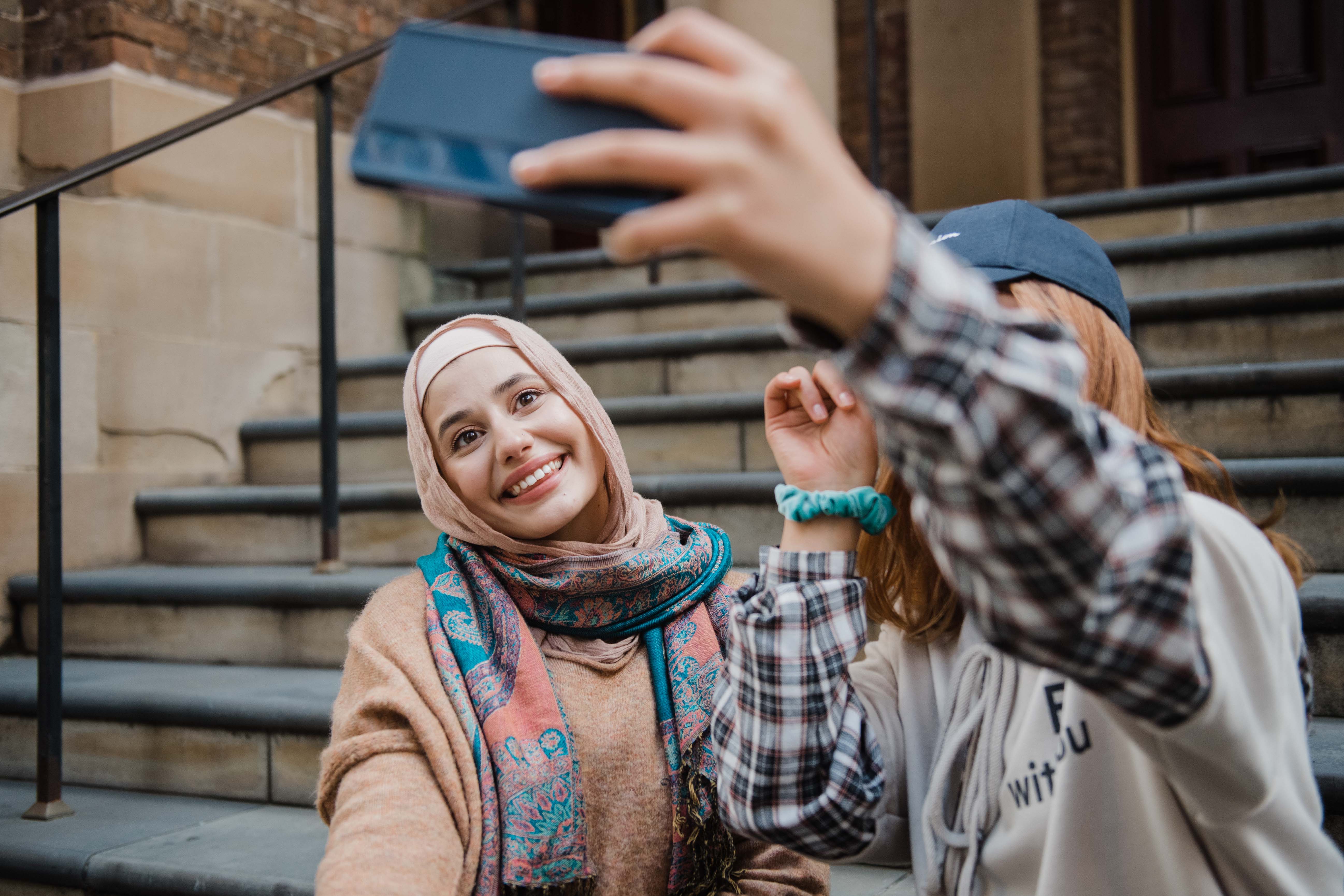 Hope and Sarah taking a selfie together