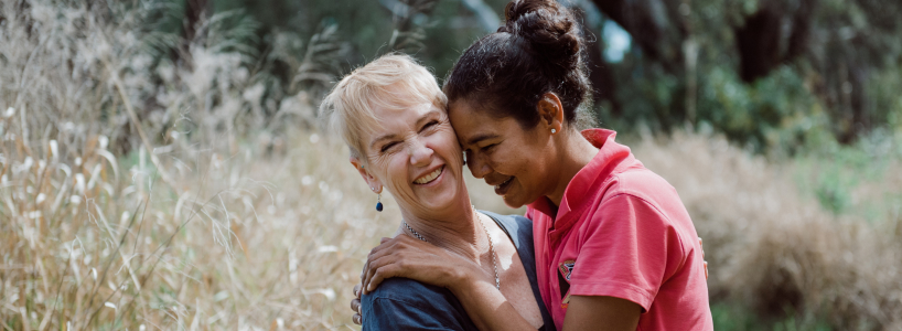 Robyn and Margaret hugging and smiling
